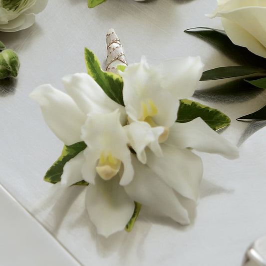 White Mini Cymbidium Boutonniere